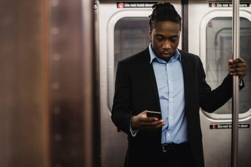 person riding train to work