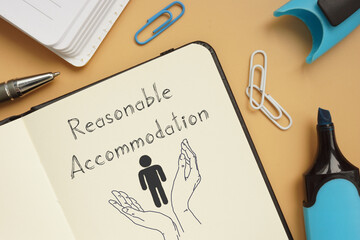 open notebook with reasonable accommodation written on it